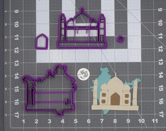 May include: Purple plastic cookie cutters in the shape of the Taj Mahal, a window, and a small square. A cookie cutter in the shape of India and a Taj Mahal design in beige and brown are also present. A dime is included for scale.