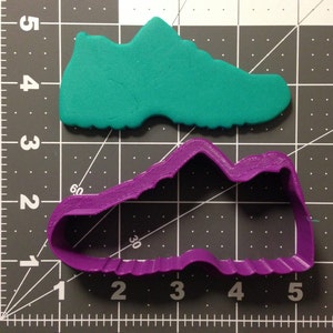 Taglierina del biscotto di scarpa