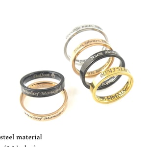 May include: Five stainless steel rings with different engravings. The rings are 4mm wide and 2mm thick. The engravings include "Padfoot", "Mischief Managed", "Goodbye mate, No", "Yours, always, D", "Yours, always", "Pure happy", "60°43'51.6", and "happy".