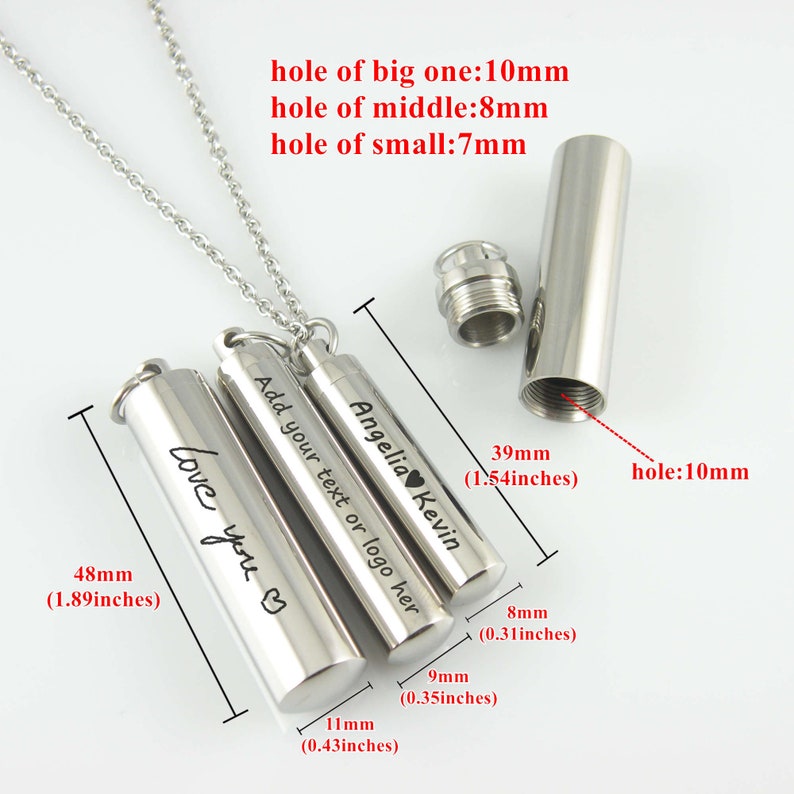 May include: Three silver cylindrical cremation urns with a chain and a silver pendant. The urns are engraved with the text "Love you", "Add your text or logo here", and "Angelia Kevin". The urns are 1.89 inches, 0.43 inches, and 1.54 inches in length.