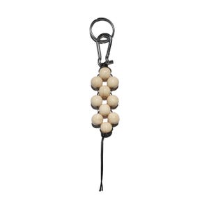 May include: A keychain featuring a cluster of smooth, cream-colored spherical beads arranged in a vertical pattern. The beads are secured with black cord and attached to a dark metal carabiner clip and a circular split ring at the top.