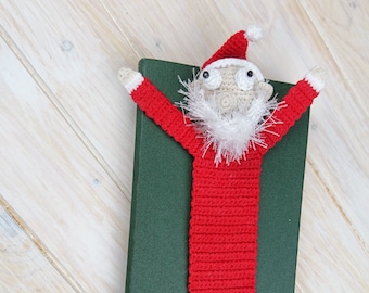 Funny Crocet Santa Claus bookmark for Secret Santa git exchange. Sock stuffer peeking Christmas bulk for bookish coworkers & boss