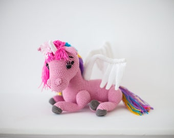 Winged Unicorn - pink unicorn with the white wings and raibow mane