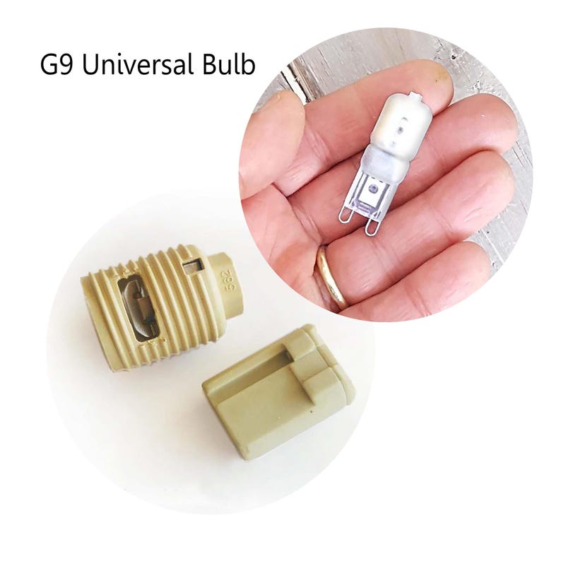 May include: A G9 universal bulb, shown with a light tan bulb socket and cover. The bulb is small, clear, and rectangular, with two metal prongs. The text "G9 Universal Bulb" is in the upper left corner.