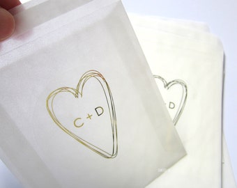 Personalised Wedding Favour Glassine Bag, golden Heart and Monogram, pack of 10