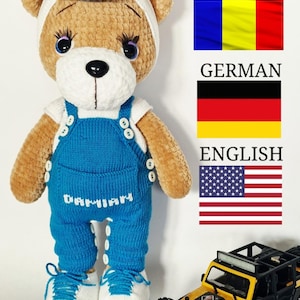 May include: A crocheted teddy bear wearing blue dungarees and a matching cap. The bear has white shoes and a white shirt. A yellow toy car is also in the image. The word "PATTERN" is at the top.