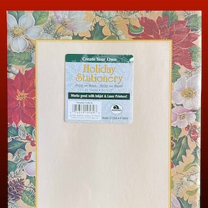 May include: A pack of 25 sheets of 8.5 x 11 inch holiday stationery paper with a floral design featuring poinsettias, holly, and white flowers. The paper is designed to be used with inkjet and laser printers. The package includes the text "Create Your Own Holiday Stationery" and "Print on them... Write on them!"