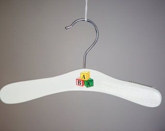 Baby hanger with building blocks motif