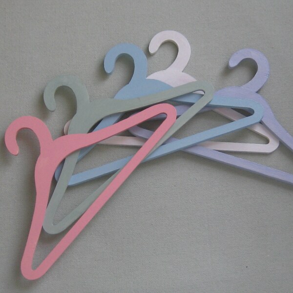 Doll's hand painted wooden hangers in pastel colours