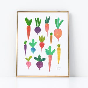 May include: A framed print featuring colorful watercolor illustrations of various root vegetables, including carrots, radishes, and beets. The vegetables are depicted in shades of orange, purple, red, and green, with a gold frame. The artist's signature is visible.