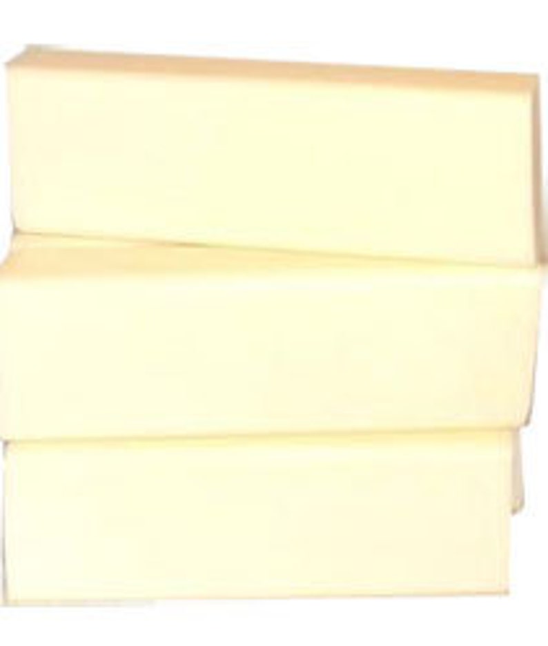 May include: Three rectangular bars of white soap.
