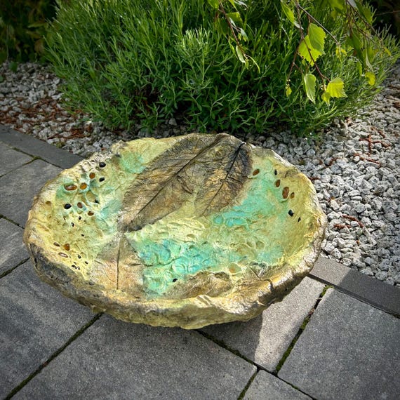 Handmade concrete bird bath: artistic garden bowl with amber glass