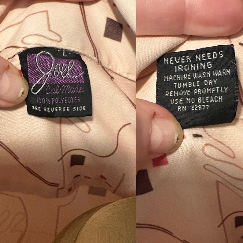 May include: Close-up of two tags from a vintage shirt. One tag reads "Joel Cal-Made 100% Polyester" and the other says "Never Needs Ironing, Machine Wash Warm, Tumble Dry, Remove Promptly, Use No Bleach, RN 22977". The shirt fabric has a light pink background with brown and red geometric shapes.