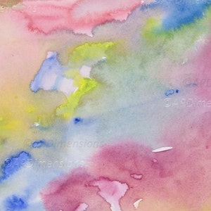 May include: Abstract watercolor painting with a blend of colors including pink, blue, yellow, and green. The artwork features soft, blended edges and a textured appearance, creating a dreamy effect. The image is a close-up of the watercolor design.