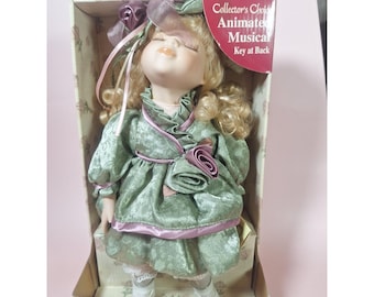 Collectors Choice 12" Fine Bisque Porcelain Animated Musical Doll Key At Back