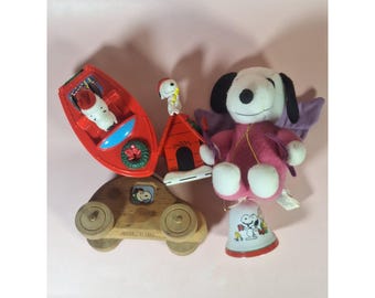 Lote vintage de Snoopy de Peanuts: porta calcetines, peluche, campana, coche y barco