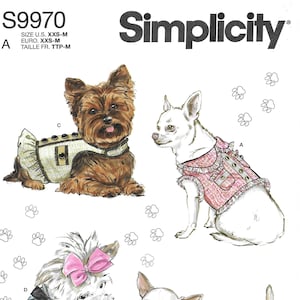 May include: Simplicity S9970 sewing pattern for dog clothes. The pattern includes illustrations of small dogs wearing various outfits, such as dresses and vests. The pattern also includes body measurements in inches and pounds.