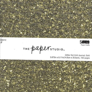 May include: Gold glitter dot grid journal from The Paper Studio. The journal measures 5.875 inches by 8.11 inches and has 192 pages. The cover is covered in gold glitter.