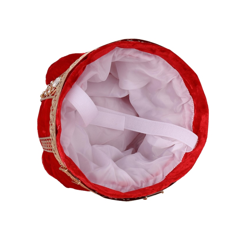 May include: Red velvet crown hat with gold accents and rhinestone embellishments. The interior is lined with white fabric and features an adjustable strap.  This regal headwear is perfect for costume parties, theatrical productions, or any occasion requiring a touch of royal flair.