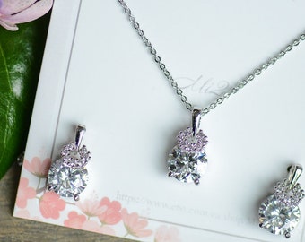 Set Gioielli Da Sposa In Zirconi Cubici AAA - Collana, Orecchini, Braccialetto E Anello, Color Oro Bianco, Ipoallergenico