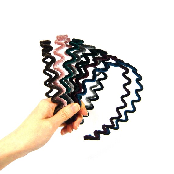 Set di 2 fasce in plastica nera a zig-zag (2 colori neri