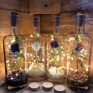 Rose in a bottle with LED fairy lights. Light up table decoration lamp. Cordless lights