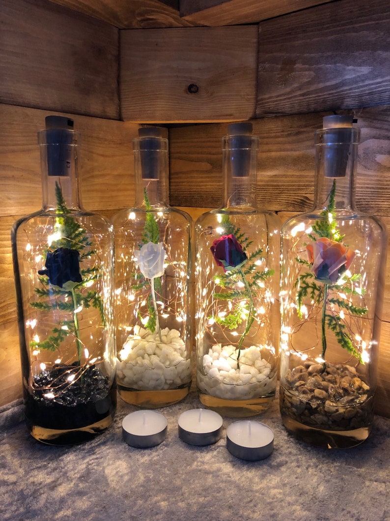 Rose in a bottle with LED fairy lights. Light up table decoration lamp. Cordless lights