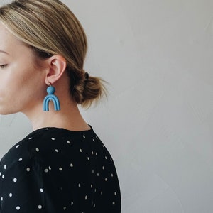 Arch shaped blue polymer clay drop / dangle statement earrings. Minimal, modern every day jewelry.