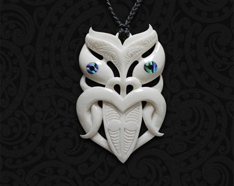 Hand-Carved Bone Wheku Pendant: Maori Warrior Necklace with Paua Shell Eyes