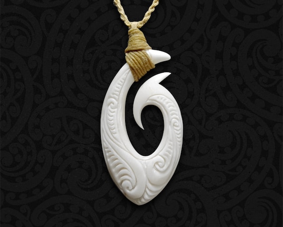 Hand-carved Maori Bone Hei Matau Necklace: Traditional Taonga for