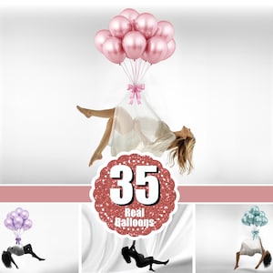 May include: A woman is floating in the air, held up by 35 pink and white balloons. The balloons are tied together with a white ribbon and a pink bow. The woman is wearing a white dress and has long blonde hair. The image is set against a white background. The text "35 Real Balloons" is on a red glitter circle.