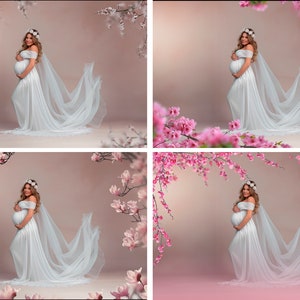 May include: A pregnant woman in a white gown with a flowing veil stands in front of a pink background with white and pink flowers.