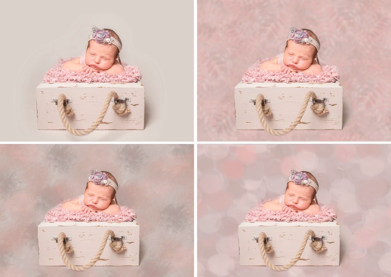 May include: A sleeping baby wearing a flower headband lies in a white wooden box with rope handles on a pink background.