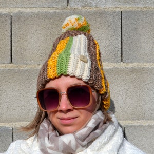 Gemütliche Damen Winter warme bunte slouchy Pom Pom geflochtene Manschette Beanie Hut Gehäkelte klobige sperrige dehnbare Krempe gestreifte Mütze