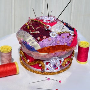 Deluxe handmade colorful scrappy round pin cushion in crazy patchwork for seamstress Floral needlework cushion Needle bed for semstress