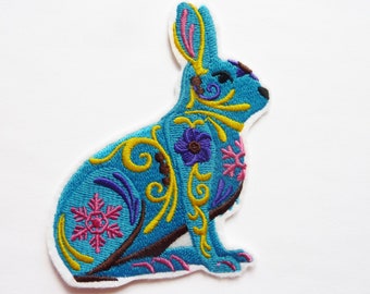 Machine embroidery, iron-on patch of a multicolored rabbit