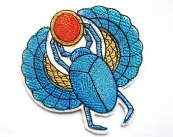 Machine embroidery of an ancient Egyptian scarab