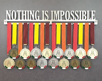 NOTHING IS IMPOSSIBLE stainless steel wall medal hanger 100% made in Italy
