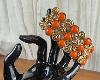Vintage Mid-Century Gold Tone Bracelet with Imitation Coral Cabochons and Fold-Over Clasp, c. 1950s–1960s