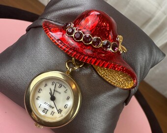 Breeze E.T.C. Co. Watchers Hat Society , Purple Rhinestone Red Enamel Gold Tone Hat With Dangle Watch Brooch/Pin M.O.P Face Vintage Brooch
