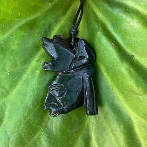 Natural stone hand carved face and frog pendant / necklace
