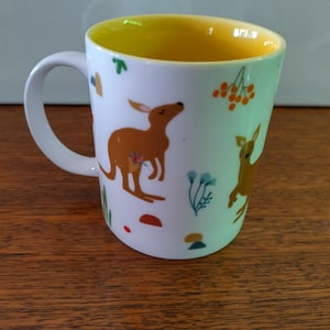 Vintage Designer Kangaroo Australia Mug by Suki McMaster for Gibson Gifts classic white cylindrical base yellow internal VGC