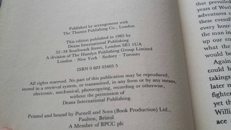 May include: Open book page with text from a 1985 edition. The text includes publishing information, ISBN, and copyright details. The page is off-white with black text.