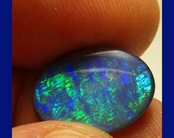 AUSTRALIAN BLACK OPAL - Classic Lightning Ridge Black Opal – 16.8 X 12.3 Millimeter Oval Shaped Cab - Rare Peacock Tail Pattern - Maine Made