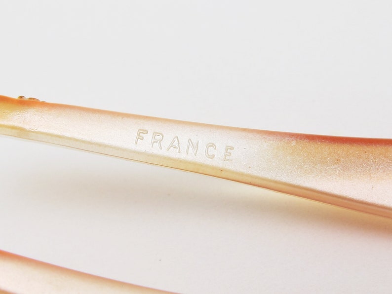 cutout tulip shape chignon pick made in France 80/'s vintage hair pick translucent orange plastic new-old-stock