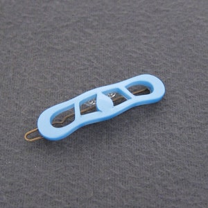 1990's vintage barrette hair clip, light blue CELLULOSE ACETATE, cutout lozenge shape, new-old-stock, made in FRANCE, tige boule wire clasp