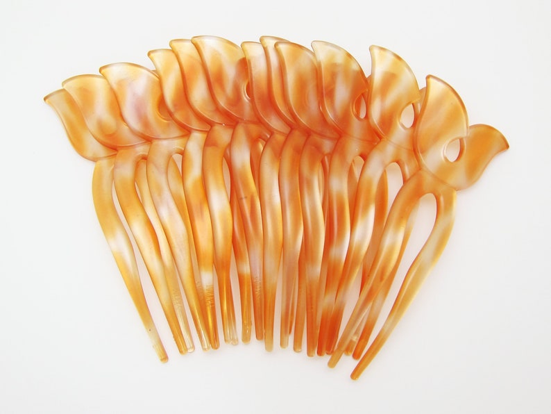 cutout tulip shape chignon pick made in France 80/'s vintage hair pick translucent orange plastic new-old-stock