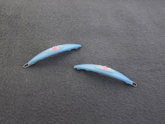 TIP-TOP 1950's vintage hair barrette clip PAIR, light blue plastic skinny oblongs, celluloid flower accents, new-old-stock, wire clasp