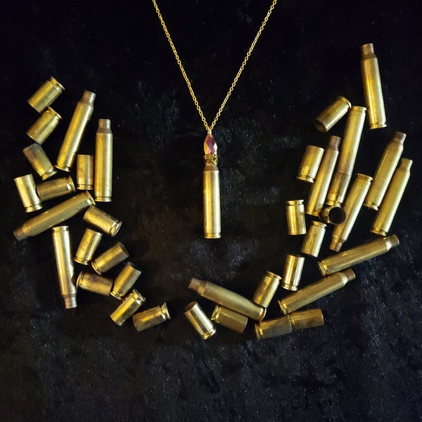 Empowering bullet shell necklace with rhinestone to feel "Bulletproof". For strength and elegance. Gold bullet casing with crystal. Unique!