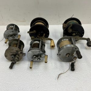 Vintage Fishing Reel Lot PENN 85 Ocean City 970 Bronson baitcasting saltwater